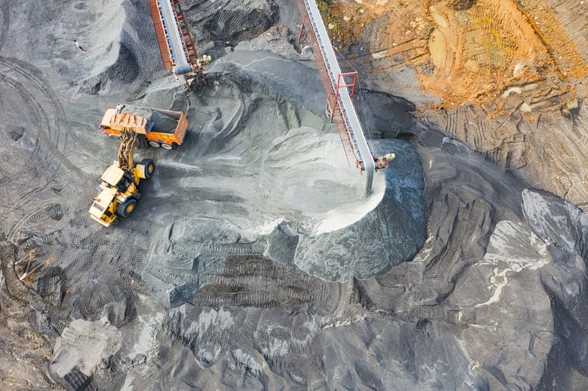 Open-pit quarry with excavated stone terraces